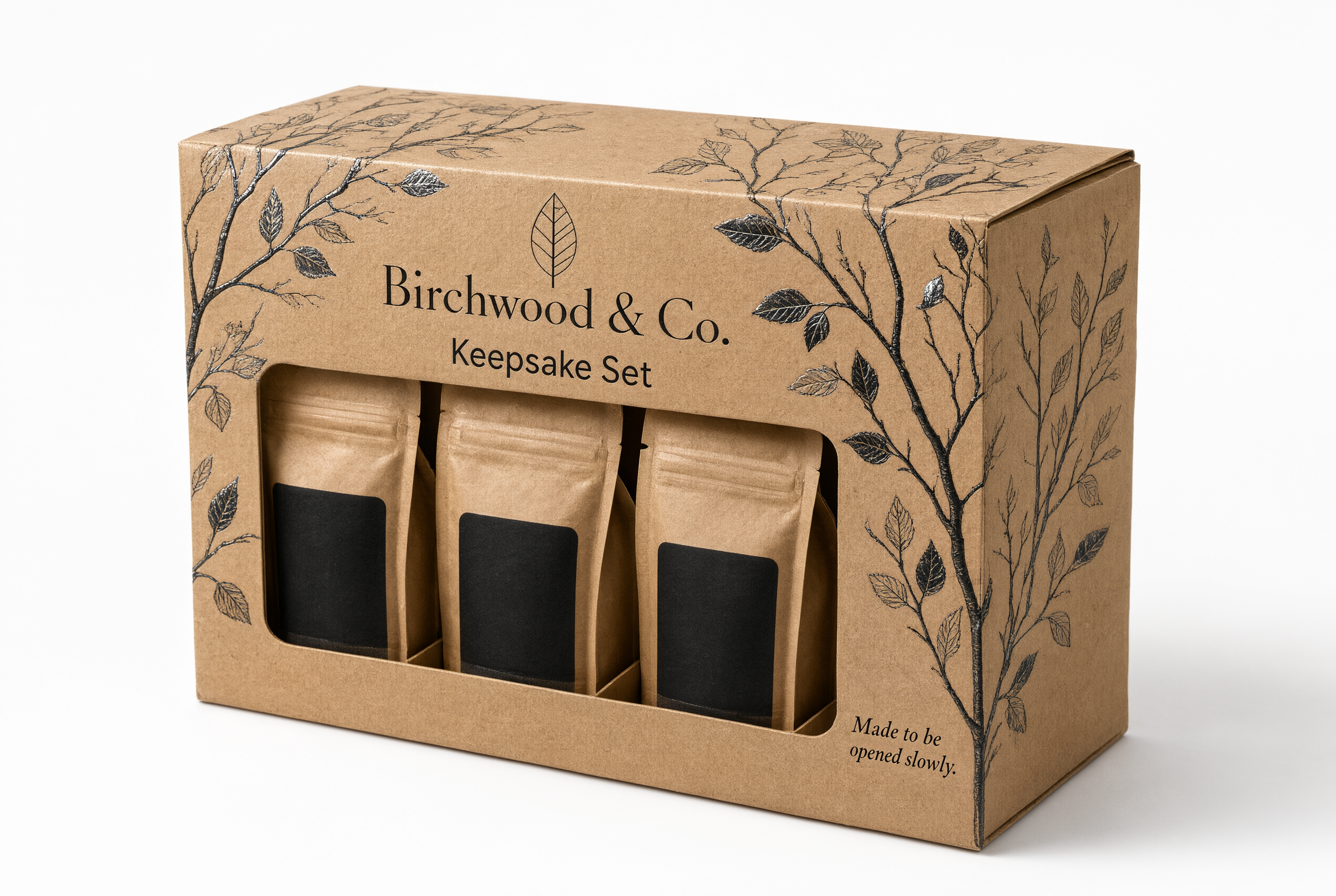Three-quarter angle of the kraft brown coffee gift carton showing the embossed lid