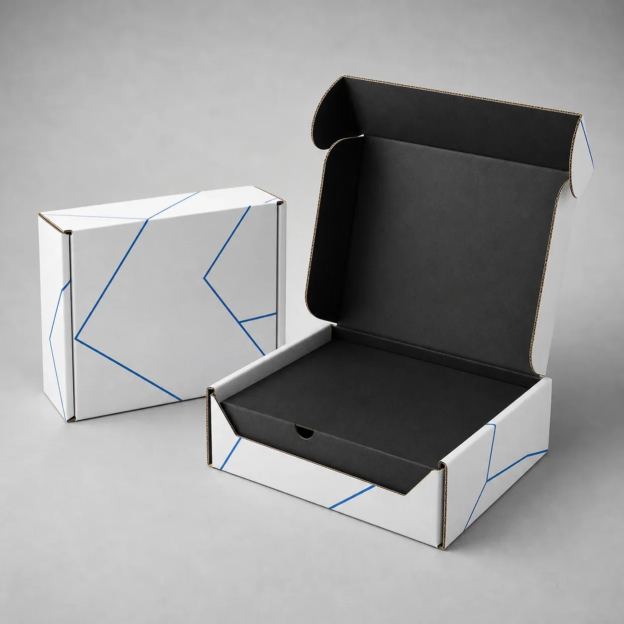 Open and closed corrugated mailer boxes with black interiors and cobalt linework