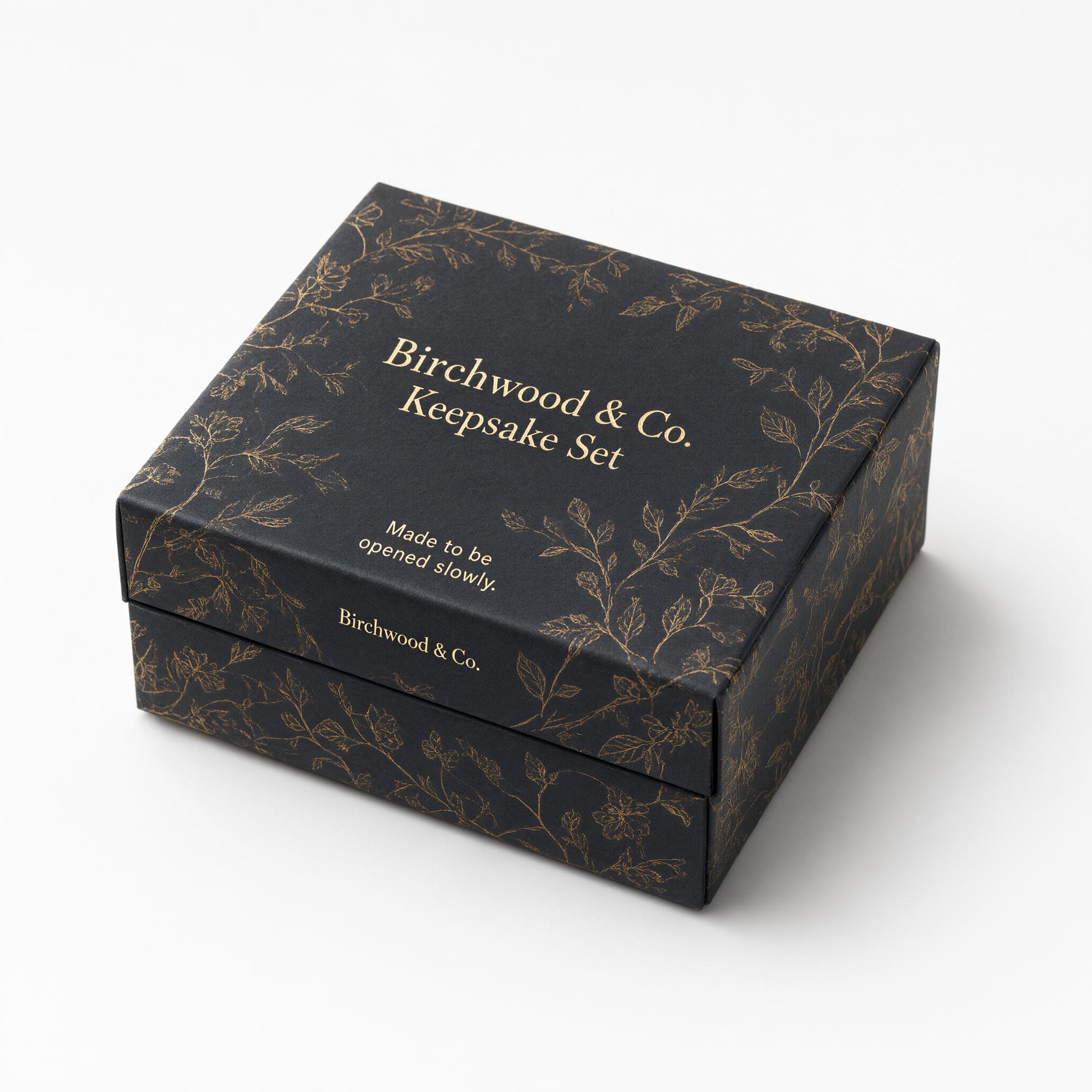 Different angle of the small charcoal rigid earring box showing the foil-stamped lid