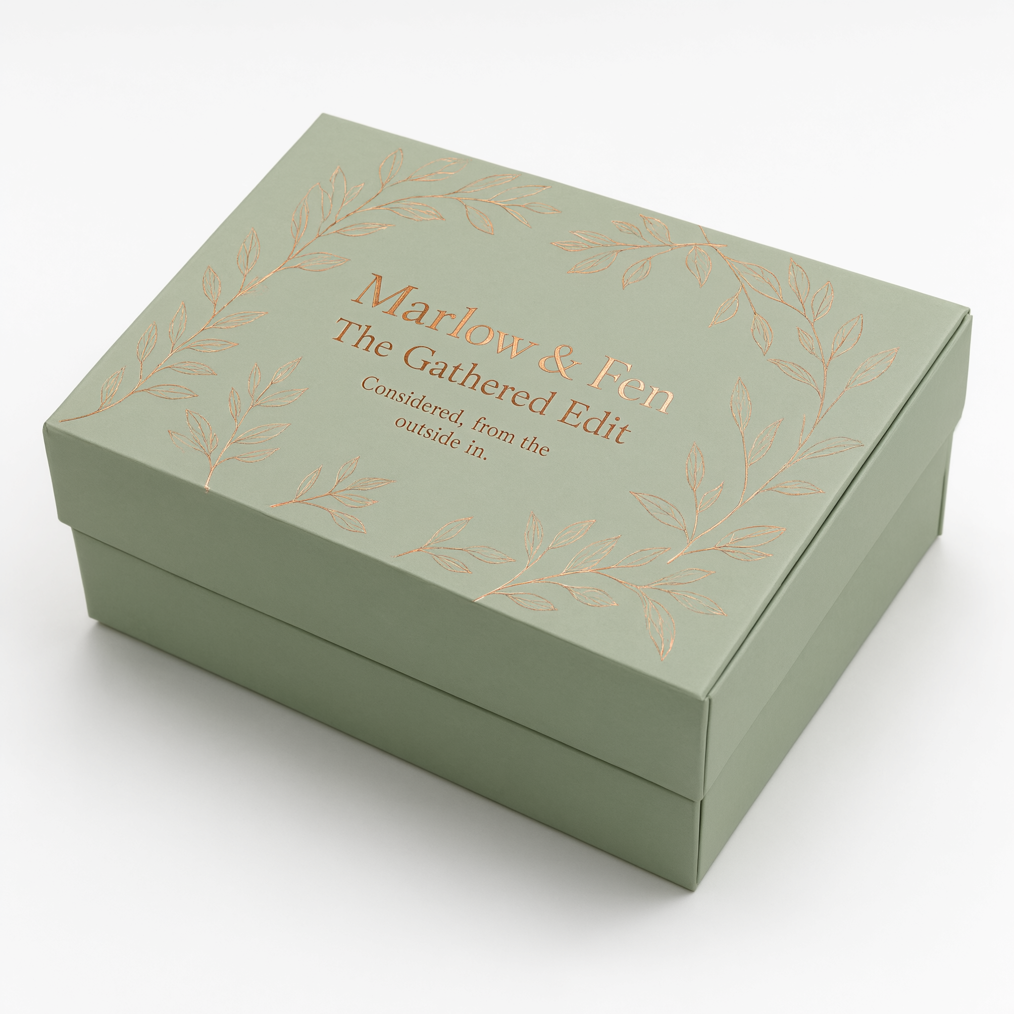 Three-quarter angle of the closed sage green rigid gift box with copper foil detail